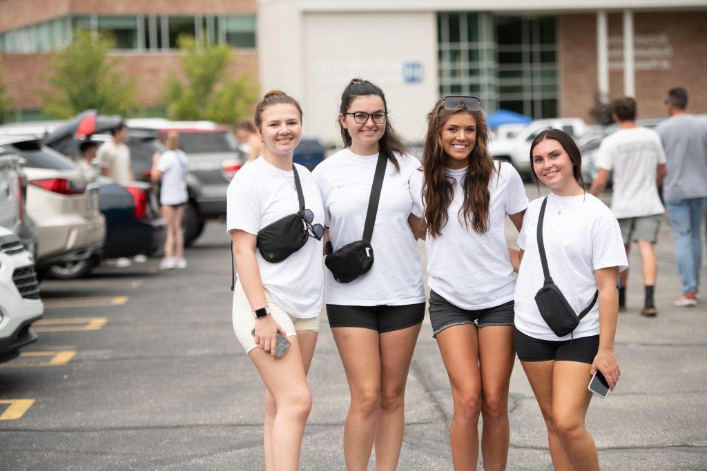 Students posing together on campus